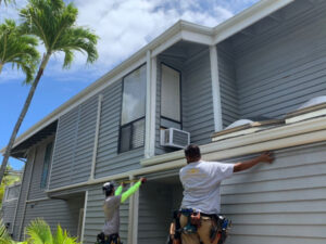 a man fixing his house